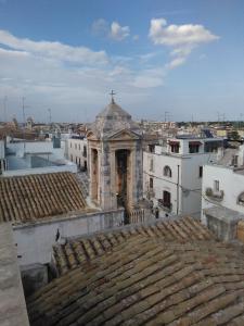 A general view of Castellana Grotte or a view of the city taken from a panziókat