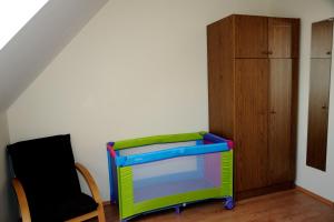 Posteľ alebo postele v izbe v ubytovaní Arany Szőlő Wellness Apartmanház