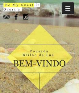 a yellow kite with the words ben vimino at Pousada Brilho da Lua in Trairi