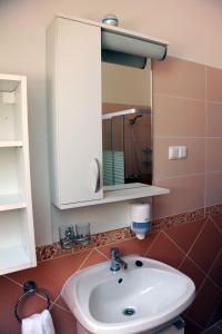 Kúpeľňa v ubytovaní Arany Szőlő Wellness Apartmanház