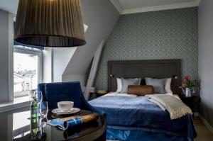 Postel nebo postele na pokoji v ubytování Frogner House - Skovveien