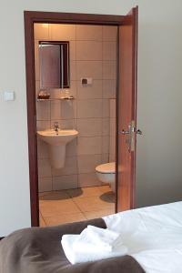 Kúpeľňa v ubytovaní A' PROPOS Hotel, Restauracja, Club