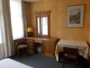 Postel nebo postele na pokoji v ubytování Hotel Manitoba