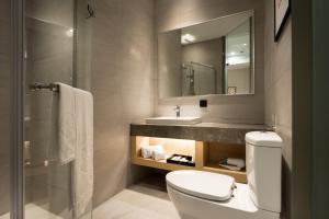 Koupelna v ubytování 台南星鑽國際商旅 Hua Hotel