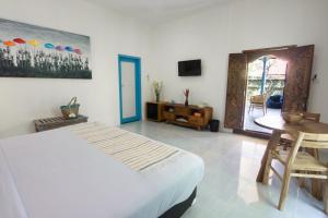 Postel nebo postele na pokoji v ubytování Sanur House + 37 fotografií