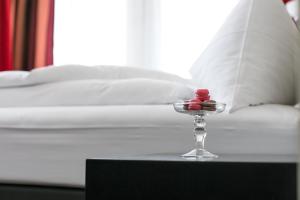 Postel nebo postele na pokoji v ubytování Hotel Metropol