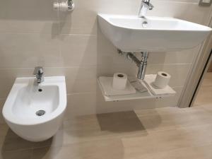 Koupelna v ubytování Hotel Altieri