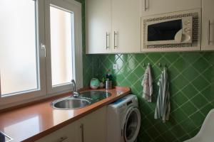 Kuchyň nebo kuchyňský kout v ubytování Casita Coqueta Free Parking