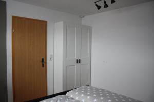 Ein Bett oder Betten in einem Zimmer der Unterkunft Ilka´s kleine Harmonie