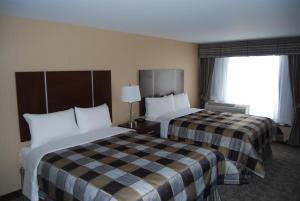 Postel nebo postele na pokoji v ubytování Days Inn by Wyndham Brampton