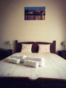 Tempat tidur dalam kamar di Quinta Ribeiro Tanquinhos