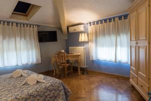 Postel nebo postele na pokoji v ubytování BB La Bella Addormentata e il Principe Calaf
