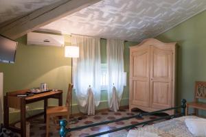 Postel nebo postele na pokoji v ubytování BB La Bella Addormentata e il Principe Calaf