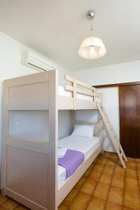 Krevet ili kreveti na sprat u jedinici u okviru objekta Sea Side House Rapanas