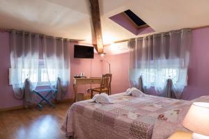 Postel nebo postele na pokoji v ubytování BB La Bella Addormentata e il Principe Calaf