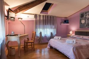Postel nebo postele na pokoji v ubytování BB La Bella Addormentata e il Principe Calaf
