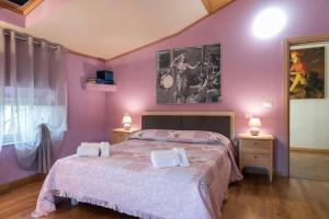 Postel nebo postele na pokoji v ubytování BB La Bella Addormentata e il Principe Calaf
