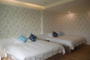 Krevet ili kreveti u jedinici u okviru objekta Pisces Garden B&B