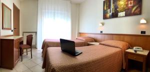 TV a/nebo společenská místnost v ubytování Hotel Sollievo - San Gennaro + 10 fotografií
