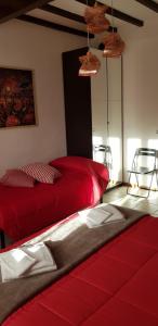 Postel nebo postele na pokoji v ubytování B&B Pierilu'