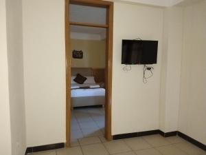Postel nebo postele na pokoji v ubytování Mekelle Hotel