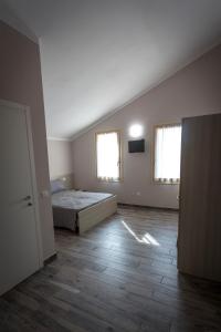 Posteľ alebo postele v izbe v ubytovaní Agriturismo Corte Casello
