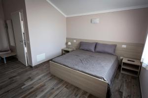Posteľ alebo postele v izbe v ubytovaní Agriturismo Corte Casello