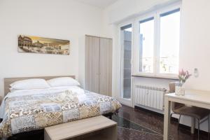 Tempat tidur dalam kamar di Affittacamere San Martino