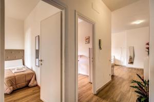 A bed or beds in a room at Aura Paradise Apartment - With parking garage