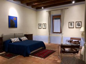 Un pat sau paturi într-o cameră la Solimago Dimora Storica