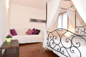A bed or beds in a room at B&b Vista sul Canal Grande
