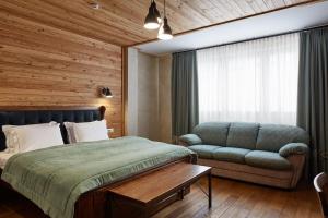Postel nebo postele na pokoji v ubytování Ganz & SPA