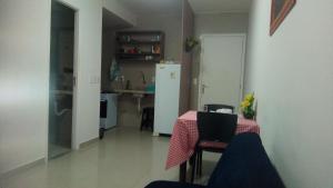 A cozinha ou cozinha compacta de VG Fun Residence