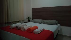 Cama ou camas em um quarto em VG Fun Residence mais 31 fotos
