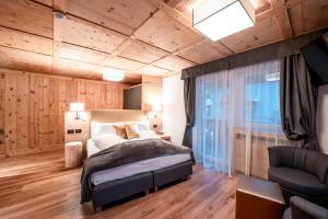 Voodi või voodid majutusasutuse Alpstyle Hotel Albolina Wellness & Beauty toas