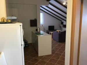 Kuchyňa alebo kuchynka v ubytovaní Apartman Carina