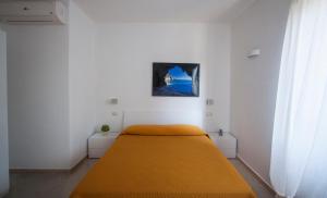 Postel nebo postele na pokoji v ubytování Affittacamere Caletta del Conero