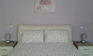 A bed or beds in a room at CASA FEDERICA