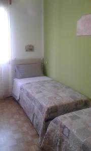 A bed or beds in a room at CASA FEDERICA
