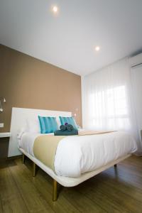 Posteľ alebo postele v izbe v ubytovaní Holidays2Malaga Malagueta Studio