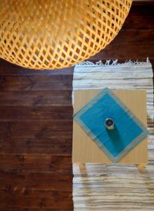 a blue box sitting on top of a wooden floor at House Galini in Halki