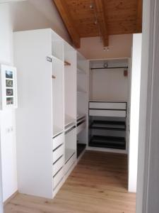 A bed or beds in a room at Ferienhaus Hubertus Tirol 1-8 Personen