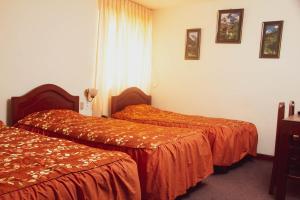 Cama ou camas em um quarto em Hotel Internacional
