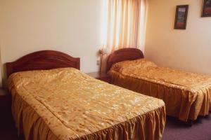 Ένα ή περισσότερα κρεβάτια σε δωμάτιο στο Hotel Internacional +19 φωτογραφίες