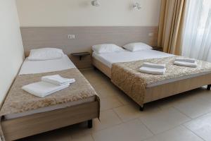 Cama o camas de una habitación en Hotel Morskaya Volna
