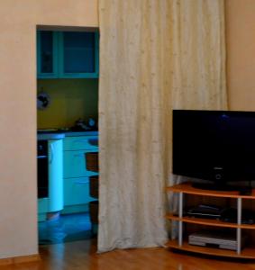 TV a/nebo společenská místnost v ubytování Cottages Delloress