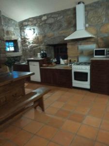 Köök või kööginurk majutusasutuses Casa da Costeira
