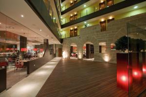 a lobby of a building with a wooden floor at F&G Logroño in Logroño