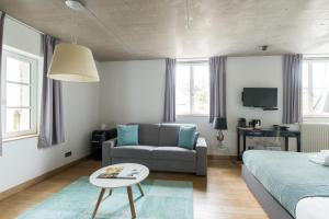 Rúm í herbergi á La Pipistrelle Hotel