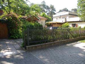 a iron fence in front of a house at House and Apt. in Siofok/Balaton 19755 in Siófok